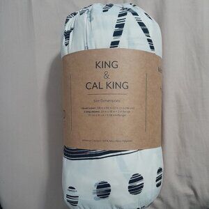 Cream or tan and black three-piece king size duvet cover